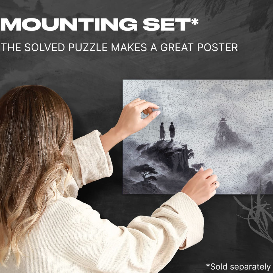 Black and White Serenity wooden puzzle — hand holding wooden puzzle piece detail