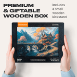 Classic Wonderhouse wooden puzzle — hand holding wooden puzzle piece detail