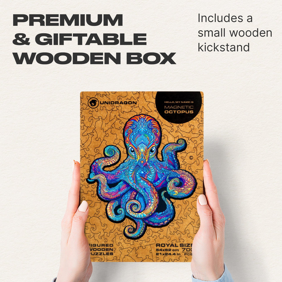Magnetic Octopus wooden jigsaw puzzle with deep-sea artwork — puzzle pieces spread out showing unique shapes