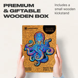 Magnetic Octopus wooden jigsaw puzzle with deep-sea artwork — puzzle pieces spread out showing unique shapes