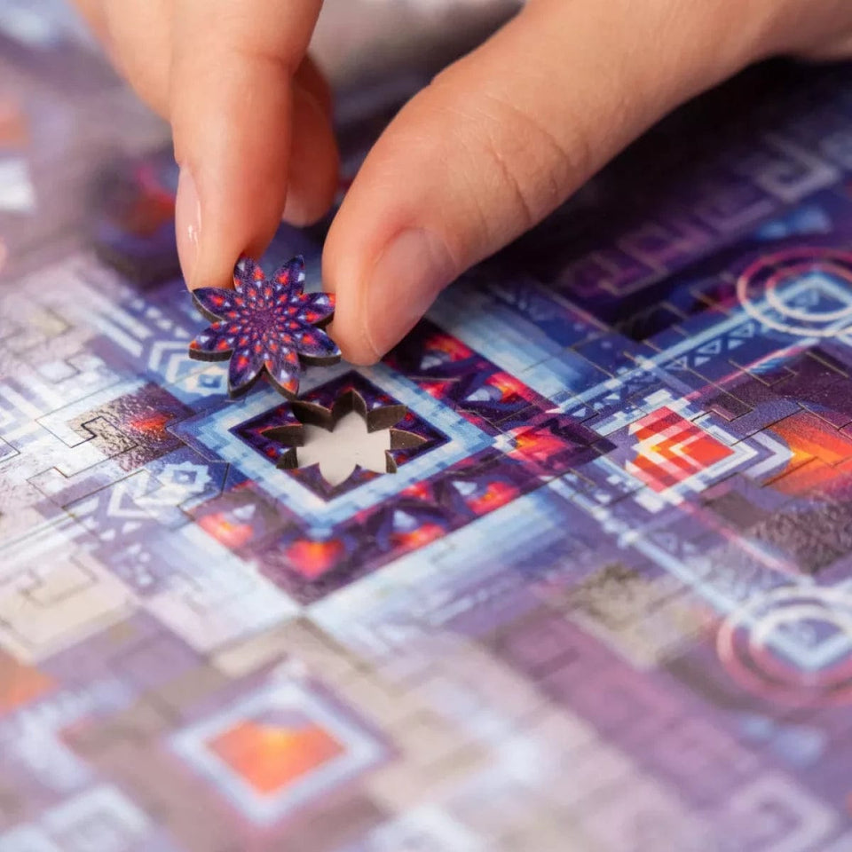 Neon Geometry wooden brain teaser puzzle — in use with hands assembling