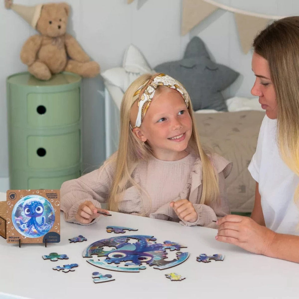 Octopus Bubblezz Bubblezz wooden puzzle — in use with hands assembling
