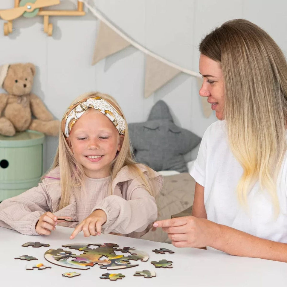 Parrot Bubblezz Bubblezz wooden puzzle — in use with hands assembling