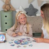 Unicorn Bubblezz Bubblezz wooden puzzle — in use with hands assembling
