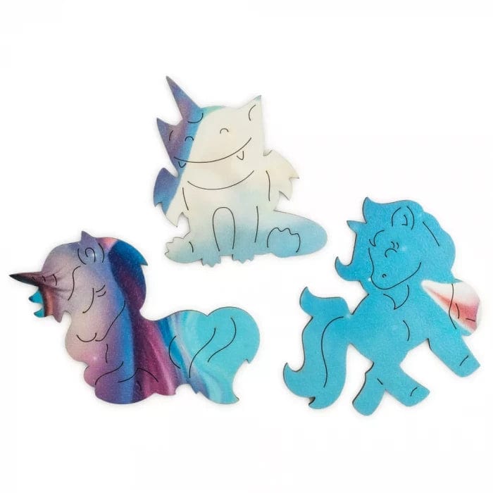 Unicorn Bubblezz Bubblezz wooden puzzle — hand holding wooden puzzle piece detail