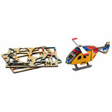 Airoport City wooden art puzzle — hand holding wooden puzzle piece detail