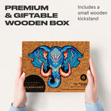 Eternal Elephant wooden jigsaw puzzle with animal-shaped pieces — puzzle pieces spread out showing unique shapes