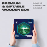 Endless Green wooden brain teaser puzzle — hand holding wooden puzzle piece detail