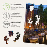 Amsterdam City wooden travel puzzle — hand holding wooden puzzle piece detail