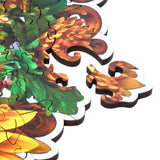 Charming Bouquet wooden puzzle — hand holding wooden puzzle piece detail
