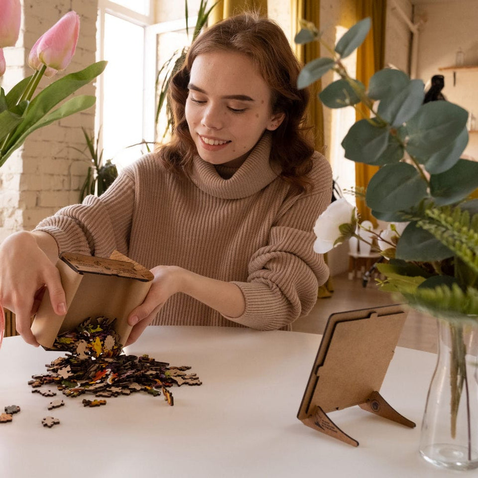 Charming Bouquet wooden puzzle — in use with hands assembling