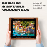 WOOSAIC Italian Riviera Limited Edition wooden travel puzzle — hand holding wooden puzzle piece detail