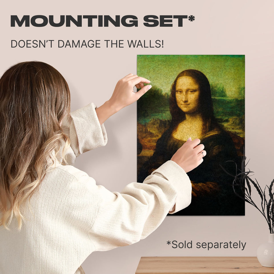 Mona Lisa wooden art puzzle — hand holding wooden puzzle piece detail