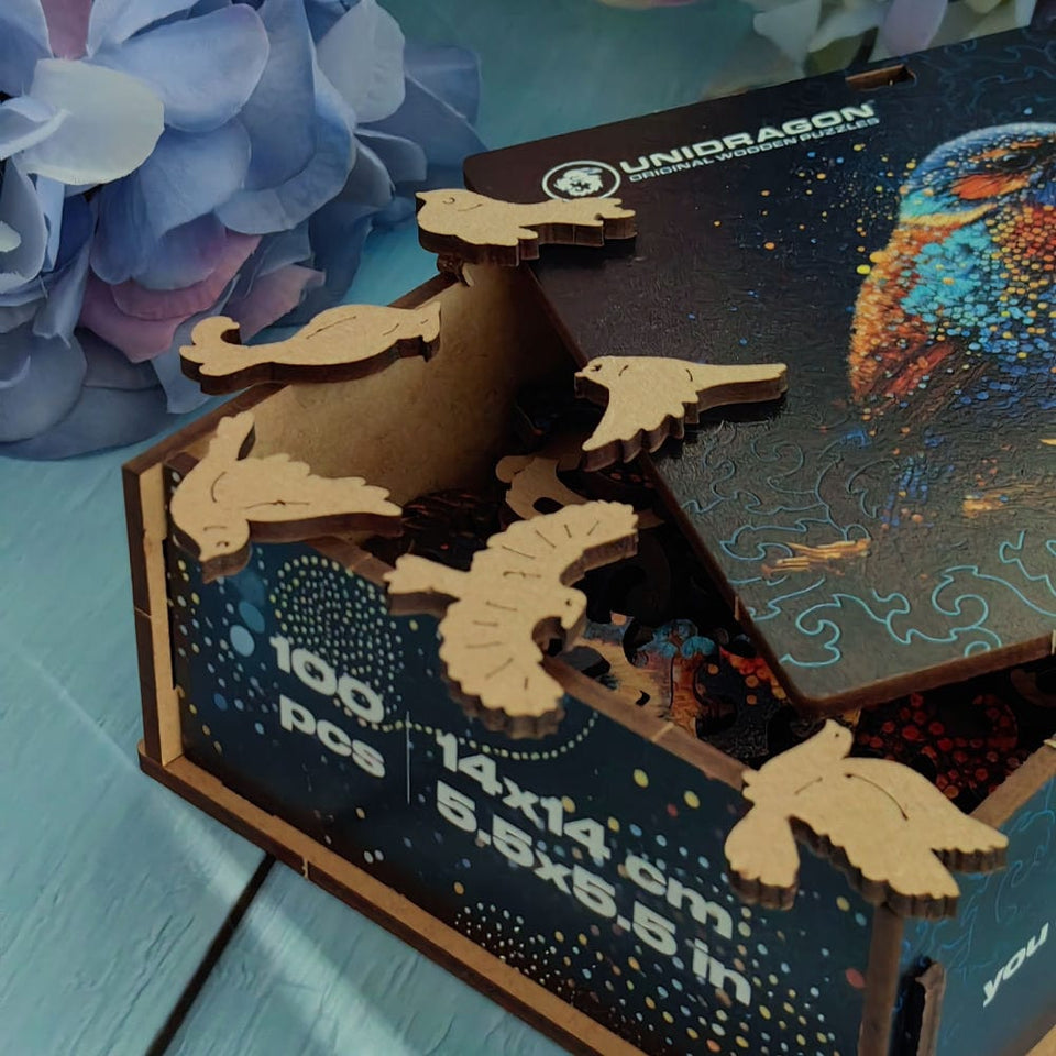 Birdy Jigsaw Puzzle wooden puzzle — in use with hands assembling