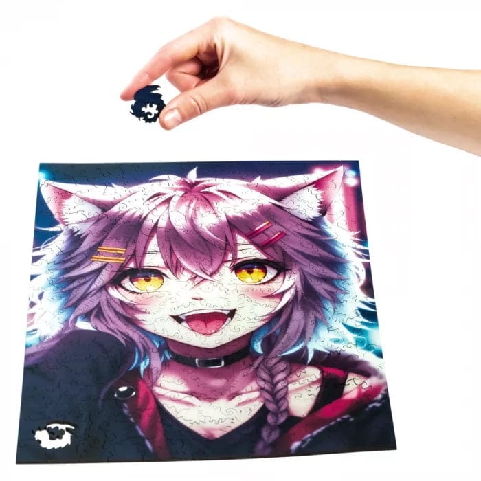 Neko Chan wooden puzzle — hand holding wooden puzzle piece detail