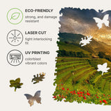 Rice Fields wooden travel puzzle — hand holding wooden puzzle piece detail