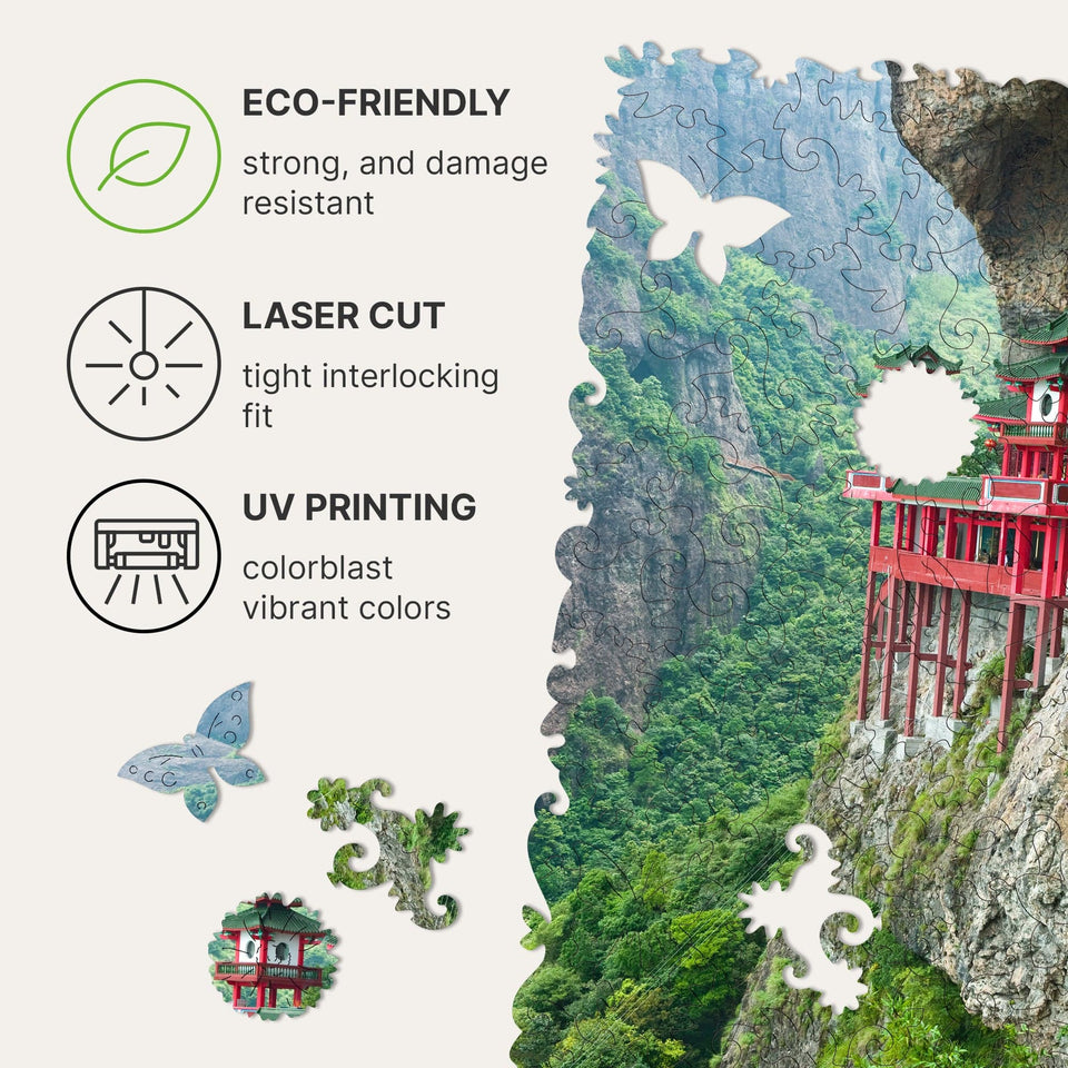 Soaring Temple wooden travel puzzle — hand holding wooden puzzle piece detail
