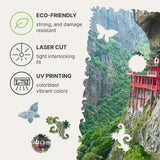 Soaring Temple wooden travel puzzle — hand holding wooden puzzle piece detail