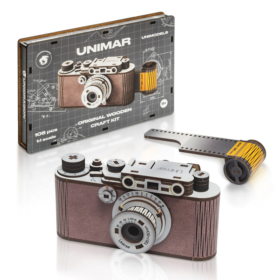 Camera Unimar wooden puzzle — front view with vivid artwork