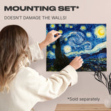 Starry Night wooden art puzzle — hand holding wooden puzzle piece detail