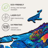 Milky Whales 2 in 1 wooden puzzle — hand holding wooden puzzle piece detail