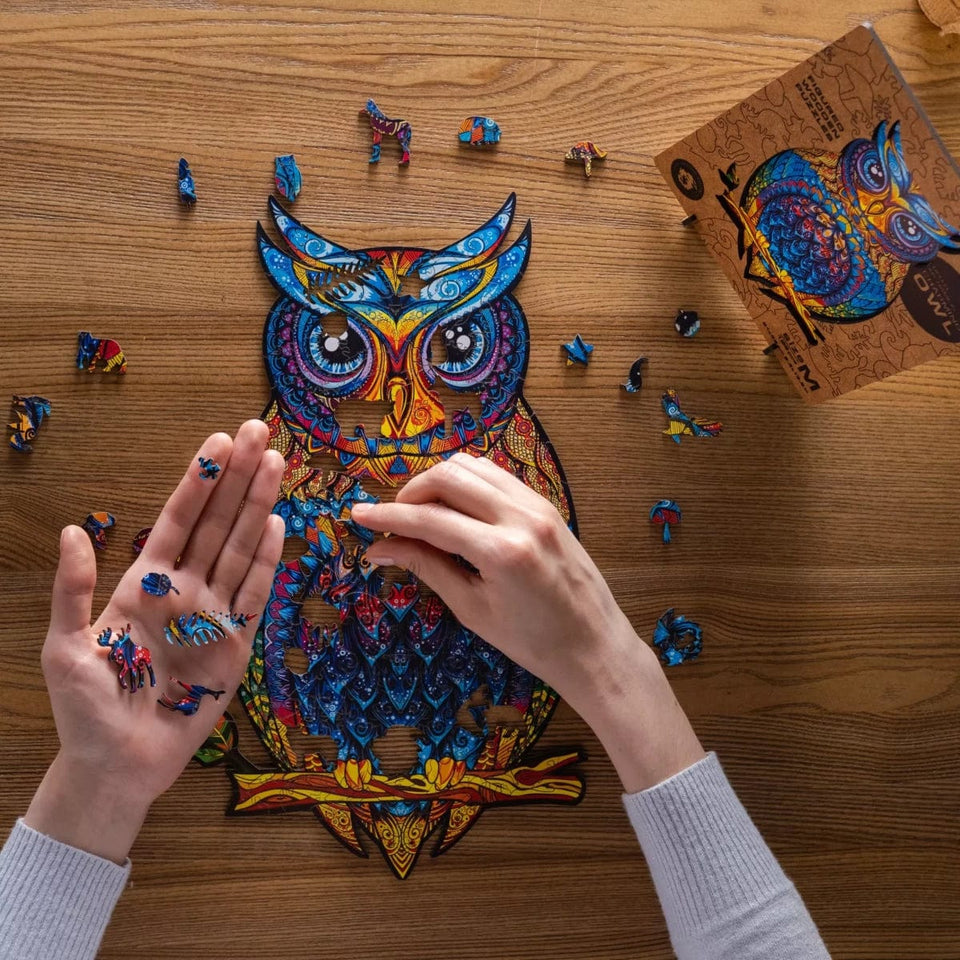 Charming Owl wooden jigsaw puzzle with hidden animal-shaped deer, fox and hedgehog pieces — reverse side hidden nature scene