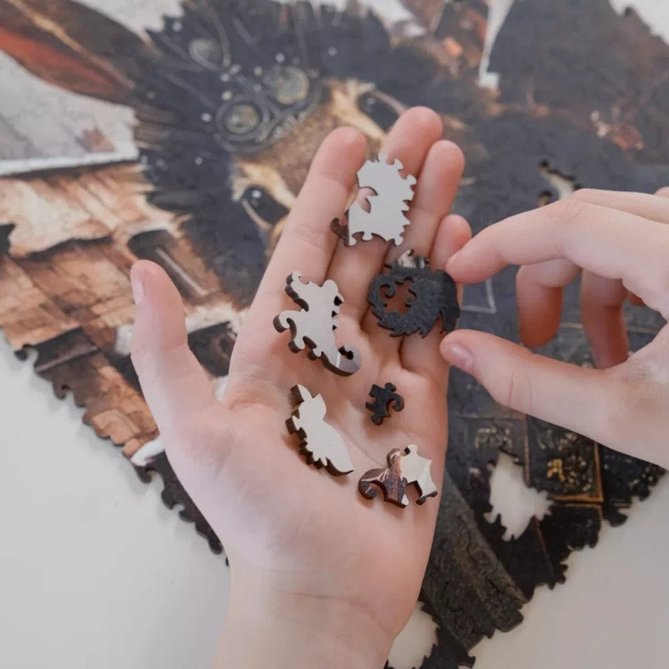 Count Rabbit wooden animal puzzle — in use with hands assembling