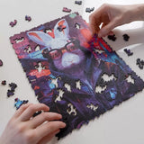Cyber Rabbit wooden animal puzzle — in use with hands assembling
