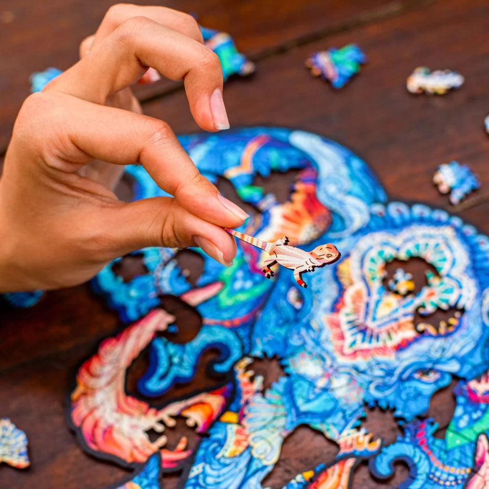 Eternal Elephant wooden jigsaw puzzle with animal-shaped pieces — reverse side hidden nature scene