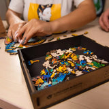 Guarding Dragon wooden animal puzzle — in use with hands assembling