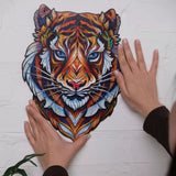 Lovely Tiger wooden puzzle — in use with hands assembling