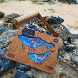 Milky Whales 2 in 1 wooden puzzle — in use with hands assembling