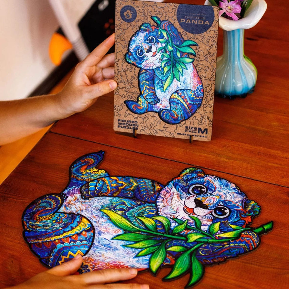 Serious Panda wooden puzzle — in use with hands assembling