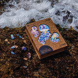 Wandering Jellyfish wooden puzzle — in use with hands assembling