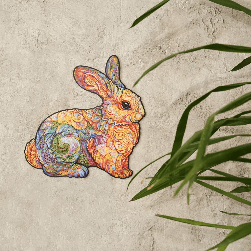 Precious Rabbit wooden puzzle — in use with hands assembling