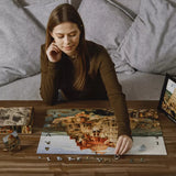 Tower of Babel wooden art puzzle — in use with hands assembling
