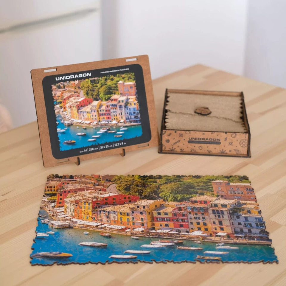 Italian Riviera wooden travel puzzle — in use with hands assembling