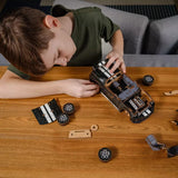 Stallion GT Black Puzzle wooden car puzzle — in use with hands assembling