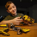 Stallion GT Yellow Puzzle wooden car puzzle — in use with hands assembling