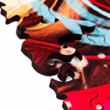 Ethnic Girl wooden puzzle — hand holding wooden puzzle piece detail